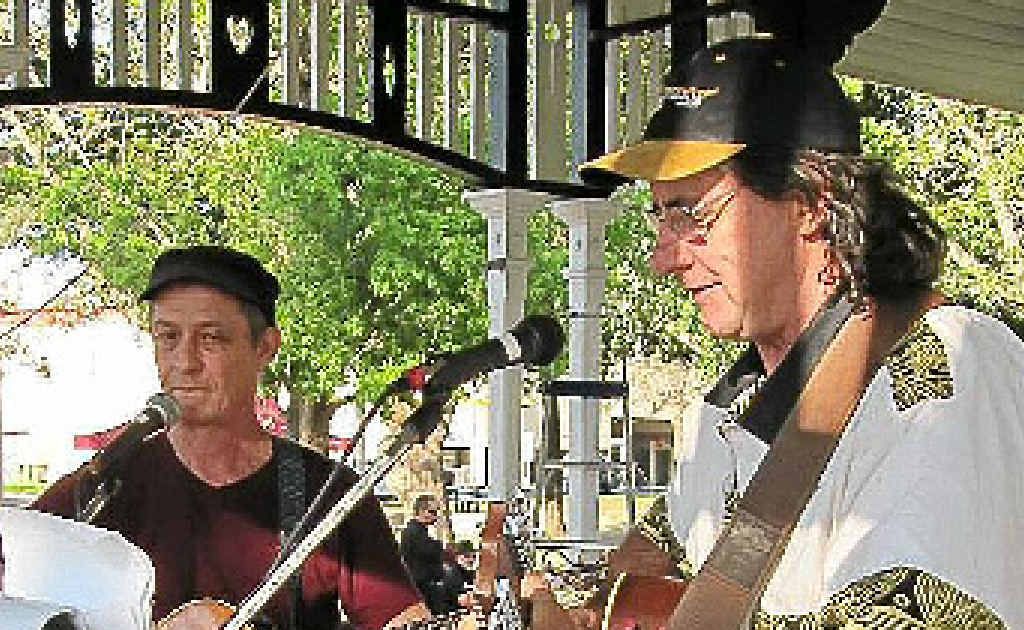 Julian Maher and Paul Dodd get into the folksy mood of peace songs. Julian Maher and Paul Dodd get into the folksy mood of peace songs.